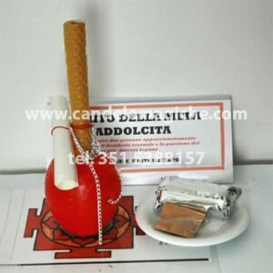 una candela ed una mela per il rito della mela addolcita