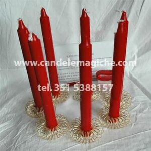 set di candele rosse per il rito nigeriano della mela