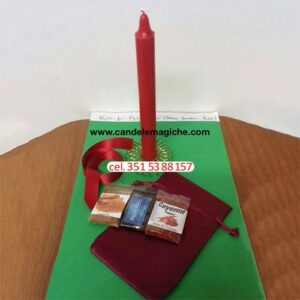 candela rossa e accessori per effettuare un rituale di passionalità