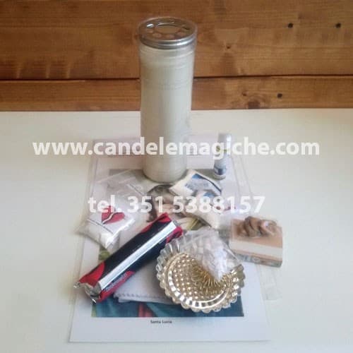 candela bianca e accessori per effettuare il rituale di santa lucia