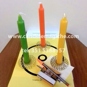 tre candele colorate, verde, arancio e gialla per rituale per ottenere lavoro