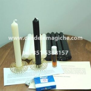 una candela bianca ed una nera per invocare il rituale del baron del cimitero
