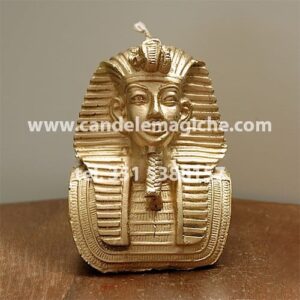 candela raffigurante il busto di faraone egiziano di colore oro