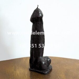 candela a forma di fallo nero