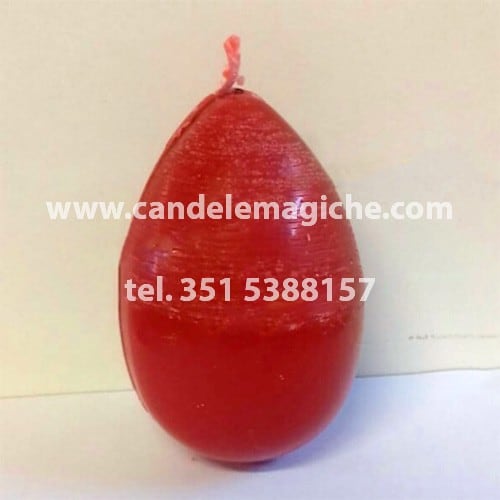 candela a forma di uovo di colore rosso
