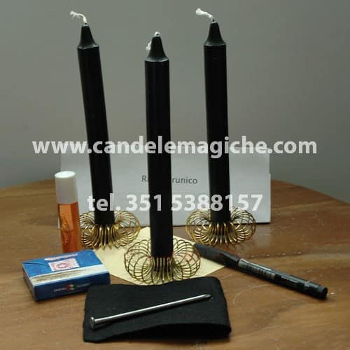 tre candele nere per rituale runico con le rune Stan e Ior